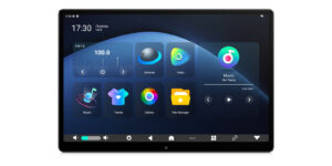 Shows the main home screen in landscape mode with a dark blue abstract background, featuring widgets for FM radio, browser, and music.