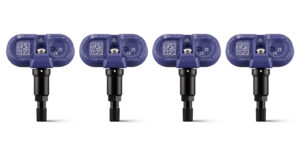 Front view of four Bluetooth TPMS sensors for Tesla vehicles.