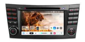 XTRONS Mercedes-Benz E-Class W211 / CLS W219 Android car stereo home screen with wallpaper widget, Bluetooth not connected, and bottom dock icons